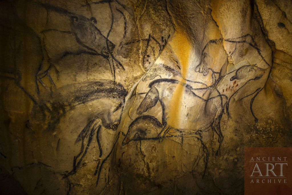 dots on Chauvet horse and lions