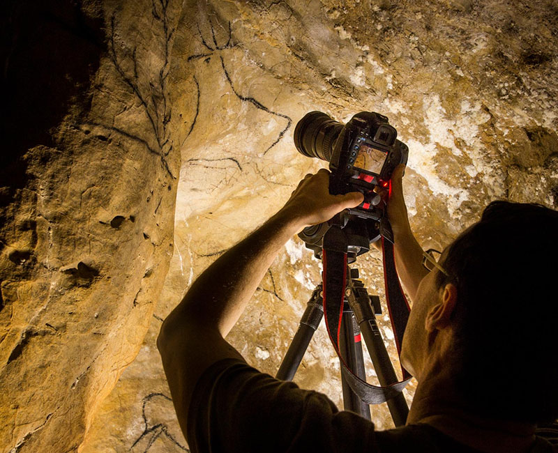 Steven Alvarez photographing the Chauvet-Pont-d'Arc Cave, France
